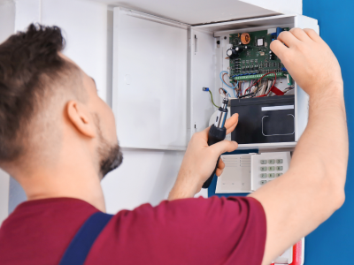 Replacing an SLA battery in a wall panel