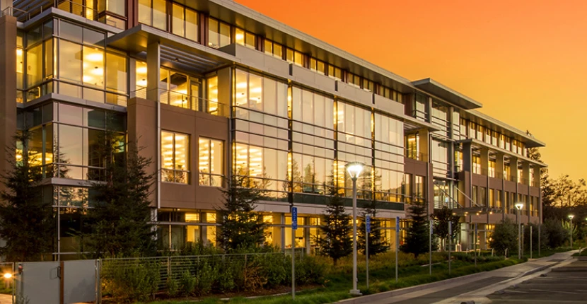 Office building with rooms lit up