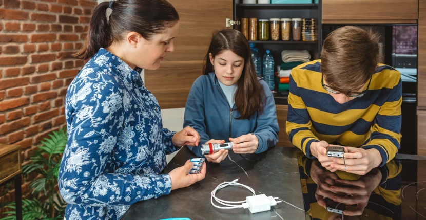 Mother and two children getting supplies together for a storm