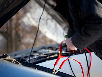 Jump starting a car with another car