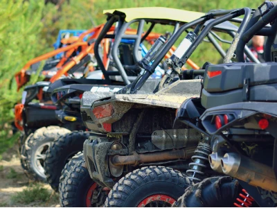 Multiple off-road vehicles lined up